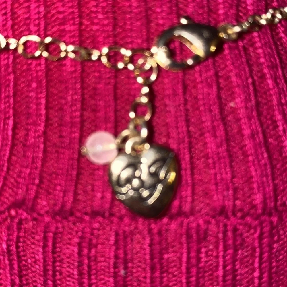 Betsey Johnson ballerina with butterfly wings and crown holding it necklace